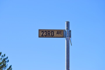 Twenty third/23rd Avenue road sign/street name