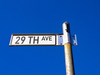 Twenty Ninth/29th Avenue road sign/street name