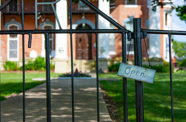 Gate to an attraction with an Open sign