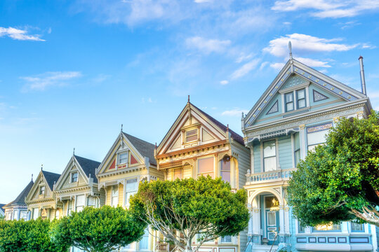 Late afternoon sun light up a row of Victorian houses known as Painted Ladies across from Alamo Square. Built between 1892 and 1896, these houses are among the most iconic symbols of San Francisco.