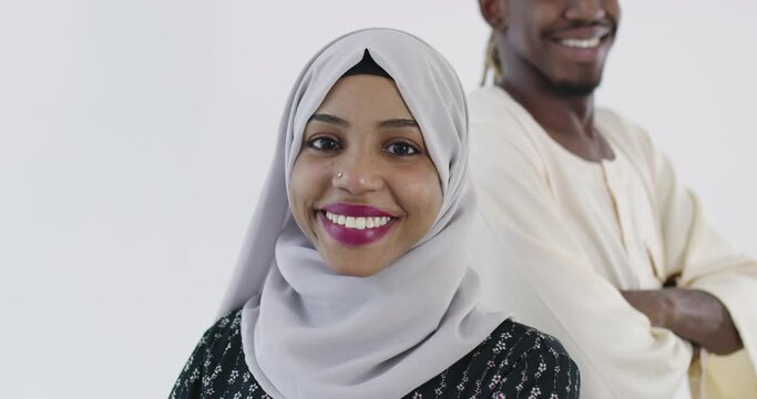 Portrait Of Black Muslim Couple Over White Background