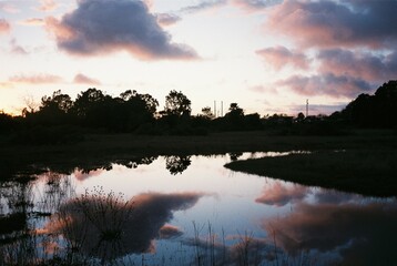 Reflective Lake River at Sunset