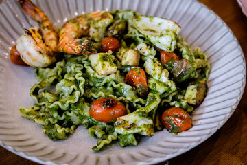 Reginette pasta with seafood pesto sauce