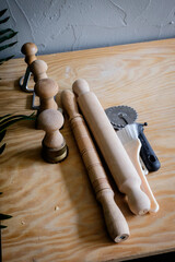 Pasta creating tools, including rolling pins and stamping molds