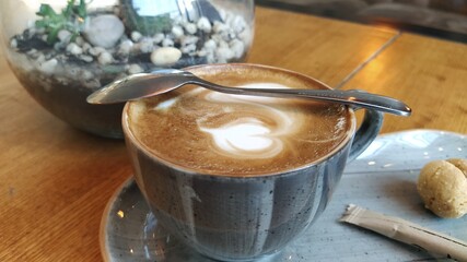 cup of cappuccino. blue cup and cappuccino foam