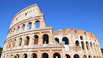 Fototapeta na wymiar A view of the exterior of the Colosseum in Rome, Italy.