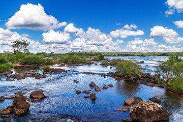 Fototapeta na wymiar River, Iguaçú waterfall, National Park , Blue sky