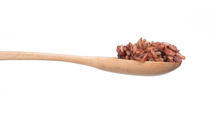 Jasmine Brown Rice on wooden spoon isolated on white background