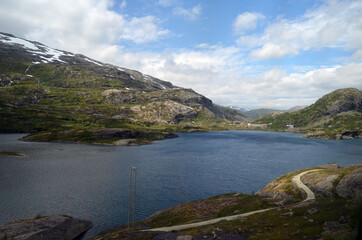 Obraz premium Views from the train window. Mountain tundra of Central Norway. Railway travel in Norway.The Bergen - Oslo train.