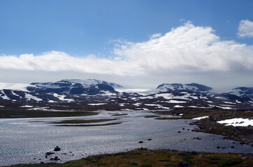 Views from the train window. Mountain tundra of Central Norway. Railway travel in Norway.The Bergen - Oslo train.