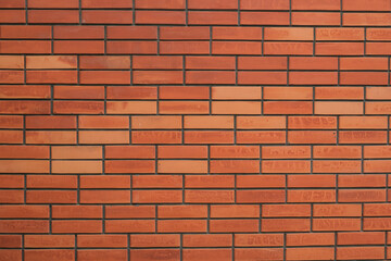 Orange brick wall, close up shot, copy space
