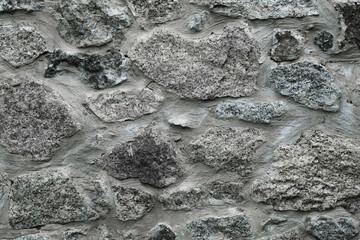 Stones with concrete texture, close up shot, background .