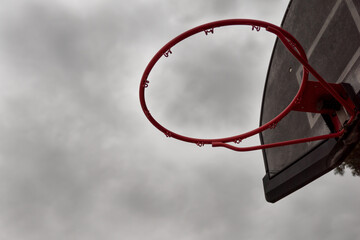 Basketball hoop on a stormy day