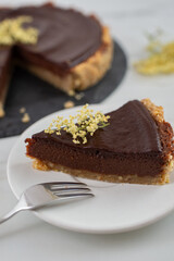 sweet home made chocolate elderflower cake on a table
