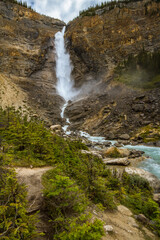 The Rocky Mountains. Majestic Takakkaw Falls waterfall on rock face and Takakkaw stream   in Yoho National Park, British Columbia, Canada. 
