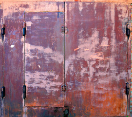 Metal garage doors painted like abstract paintings