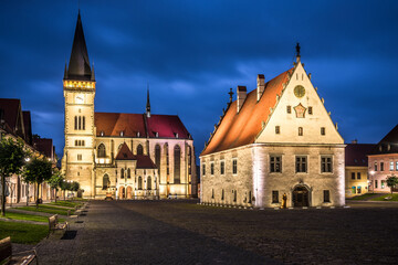 Fototapeta na wymiar Night view at the Town hall place with Basilica of St.Aegidius and Town hall in Bardejov, Slovakia