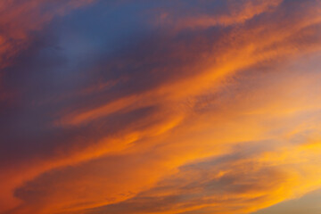 Clouds painted in the color of sunset