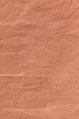 detail of old ochre plaster wall