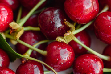 Fresh delicious red bright cherry berries torn in the summer garden