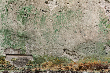 Texture of a concrete wall with cracks and scratches which can be used as a background
