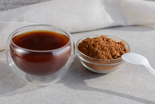 Drink from carob and kerob powder. Alternative cocoa