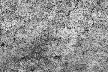 Texture of a concrete wall with cracks and scratches which can be used as a background