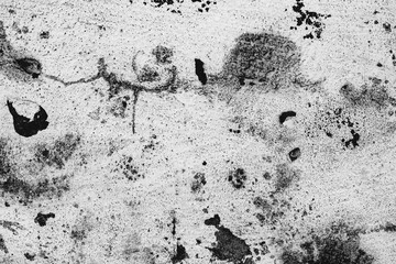 Texture of a concrete wall with cracks and scratches which can be used as a background