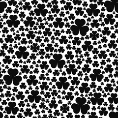 Obraz premium Black clover leaves on white background. St.Patrick 's Day. Isolated on white background. Abstract graphic black-white stock illustration. Template for coloring, textures and another design.