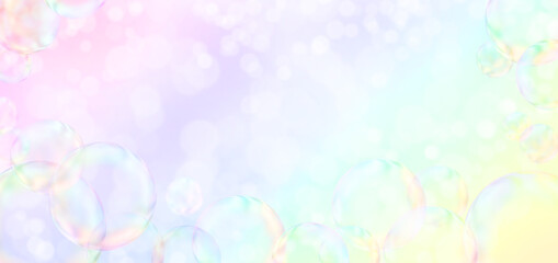 Soap bubbles on rainbow colors background