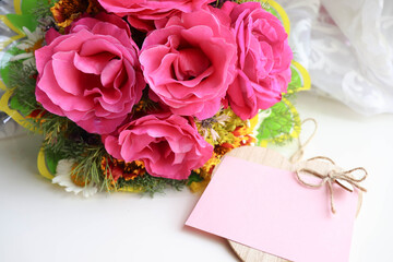 greeting card. bouquet of pink roses and place for text