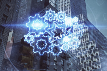 Double exposure of business theme hologram drawing and city veiw background. Concept of success.
