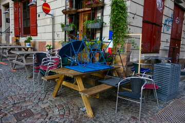 Stockholm, Sweden  Tables and chairs at a closed cafe and restaurant on Kopmantorget