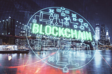 Multi exposure of cryptocurrency theme hologram drawing and city veiw background. Concept of...