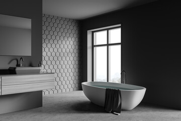 Fototapeta na wymiar Grey honeycomb tile bathroom, tub and sink