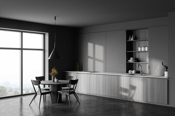 Grey and wooden kitchen corner with dining table