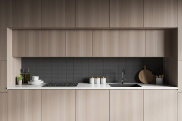 Wooden countertops in grey kitchen