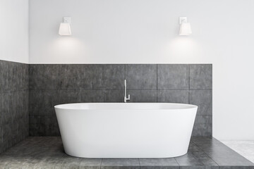 Obraz na płótnie Canvas White and grey bathroom with tub