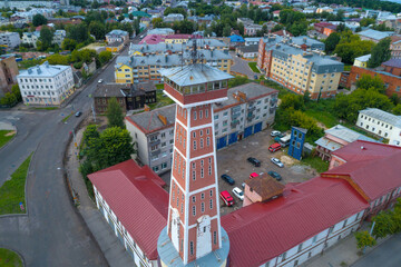 Obraz premium Old fire tower by close-up on a July day (shooting from a quadrocopter). Rybinsk, Russia
