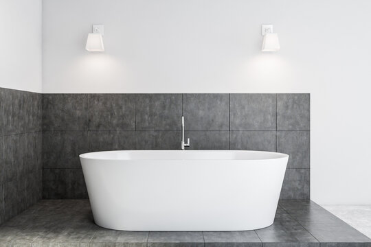White and grey bathroom with tub