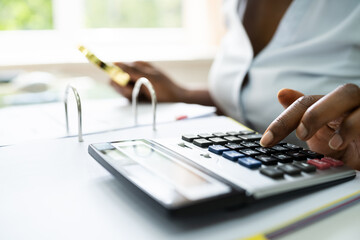 Auditor Investigating Fraud Using Magnifying Glass