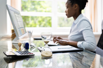 Black Accountant Woman Working With Invoice