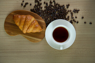 cup with coffee, breakfast coffee, a cup of coffee on old wooden table,morning