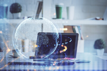 Multi exposure of table with computer and world map hologram. International data network concept.