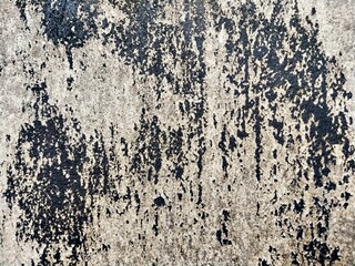 Surface with black stains