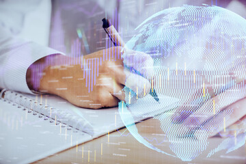 Fototapeta premium Multi exposure of man planing investment with stock market forex chart.