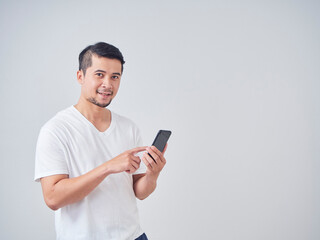 Handsome young man with smartphone.