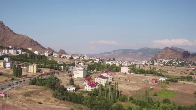 Sebinkarahisar city in north center Turkey in drought mountains landscape.  Aerial drone wide view at summer sunny day