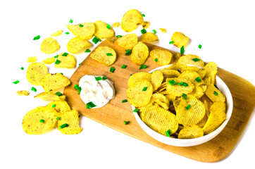 chips on a white background with green onions