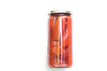 glass jar of preserved tomatoes